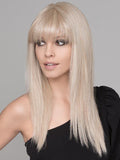 A long, edgy, and super straight synthetic wig with full bangs. The synthetic fiber is of the highest quality and has a natural density that looks and feels like real hair